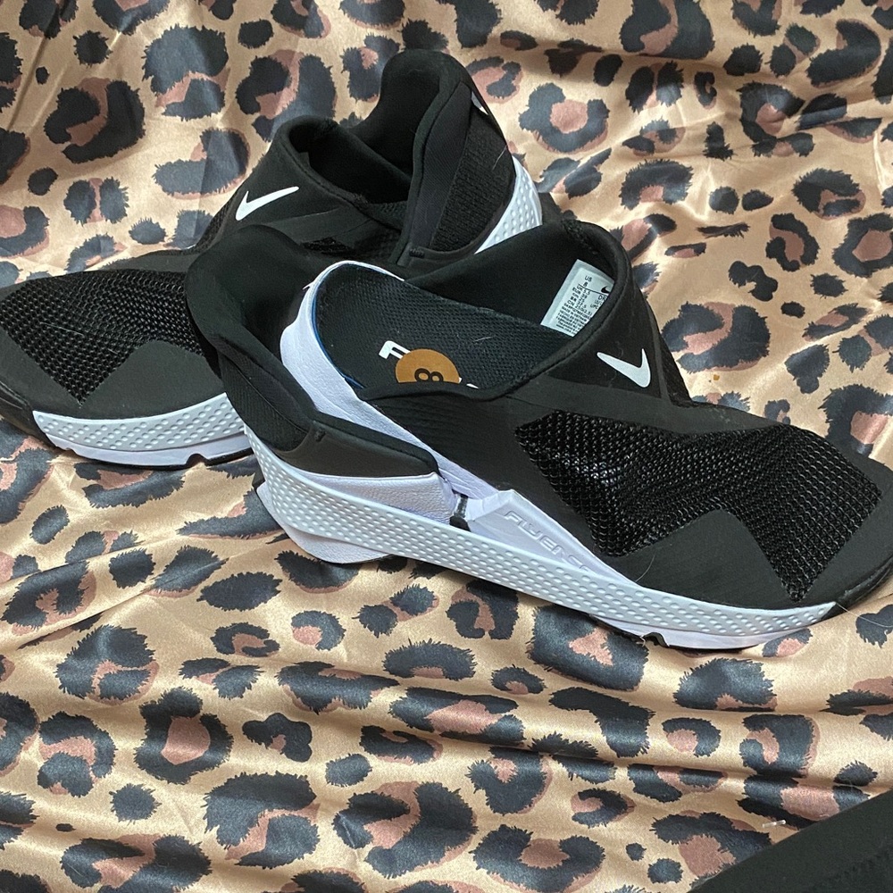 Nike Black and White Athletic Slip-Ons flyease